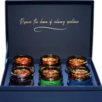 Geöffnete BBQ & Grill Box — 6 Premium-Mischungen.